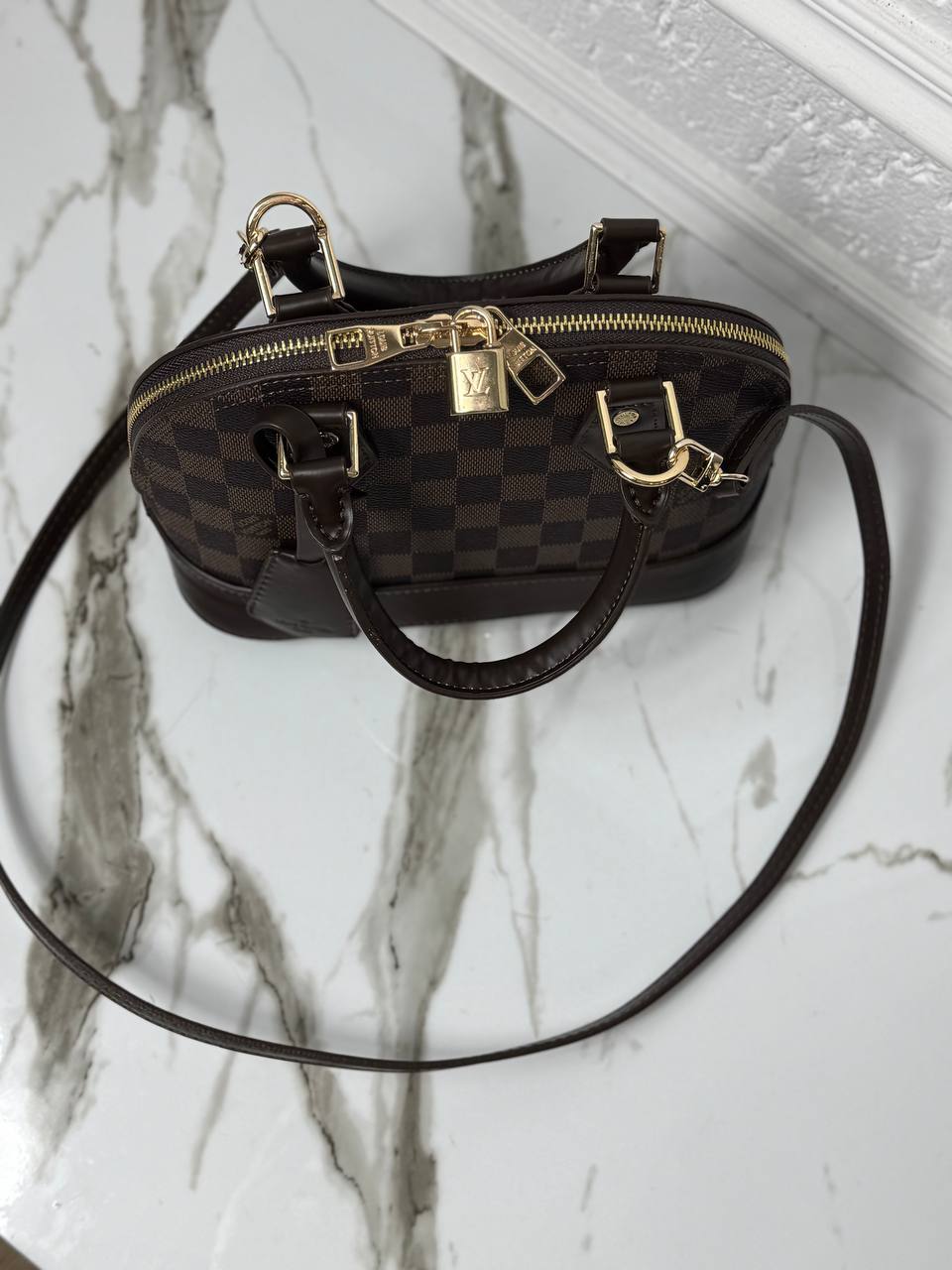 Alma Damier