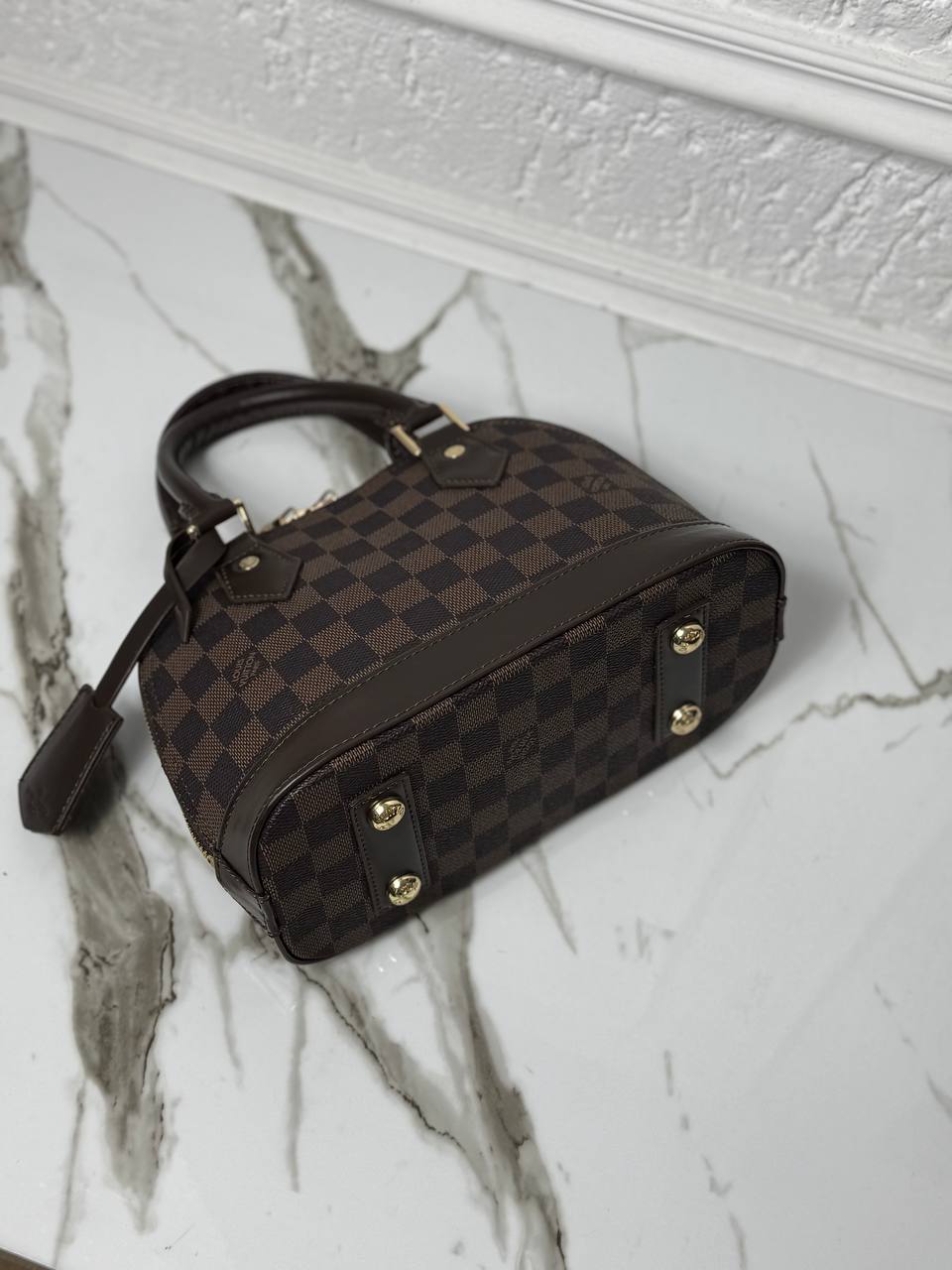 Alma Damier